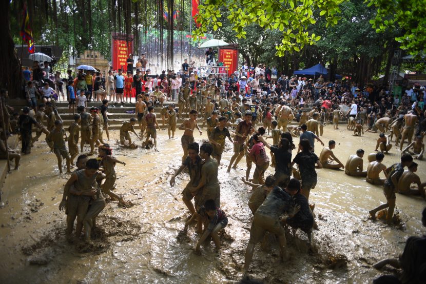cheerful-mud-ball-wrestling